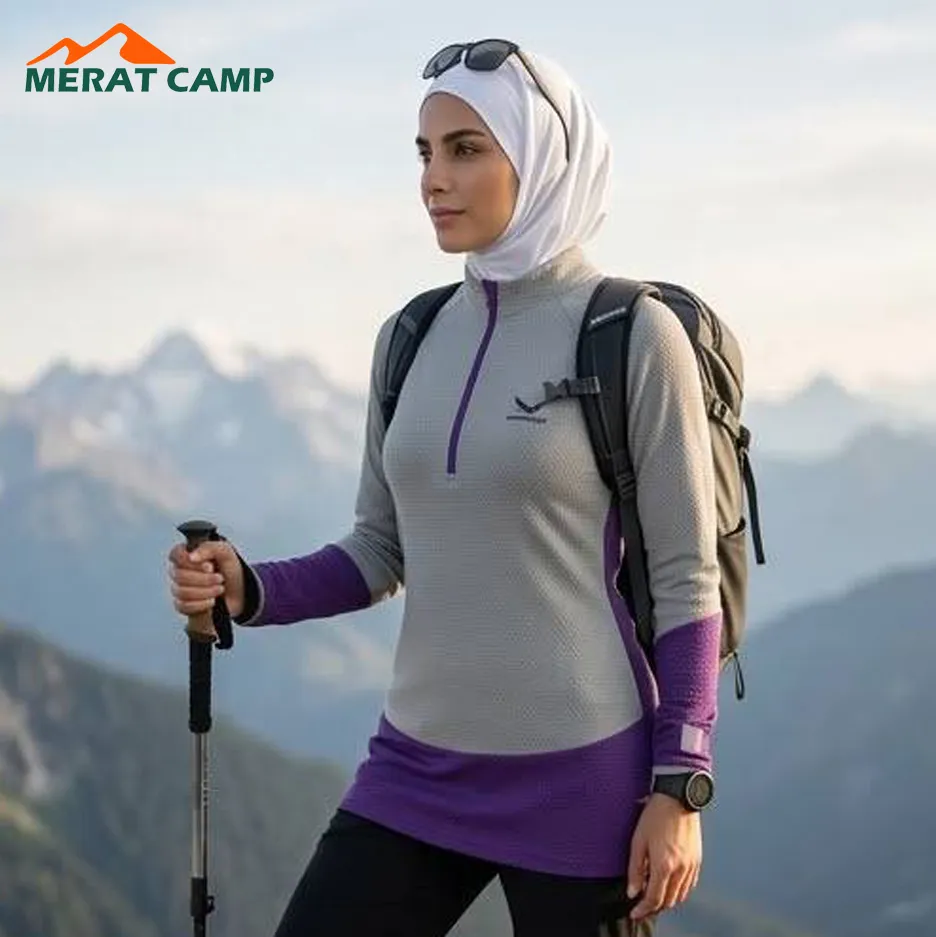 تیشرت نیم زیپ زنانه اسنوهاک مدل SN-C2118 با دوخت ارگونومیک و جنس پلی‌استر پنبه ضد حساسیت.