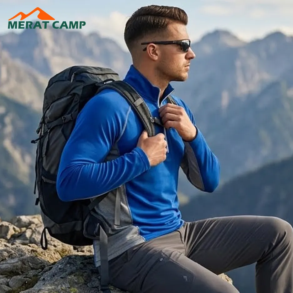 استفاده از تیشرت آستین بلند نیم زیپ اندر آرمور با رنگ آبی در کوهنوردی و ترکینگ