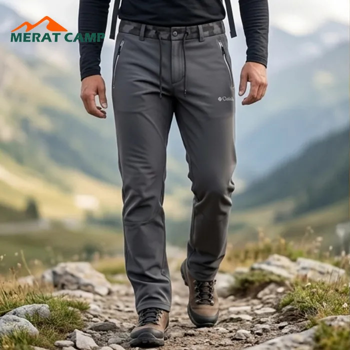 خرید شلوار کوهنوردی کلمبیا مدل Softshell داخل پلار رنگ طوسی نما از جلو در طبیعت