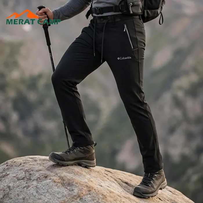 خرید شلوار کوهنوردی کلمبیا مدل Softshell داخل پلار رنگ مشکی نما ازبغل در طبیعت