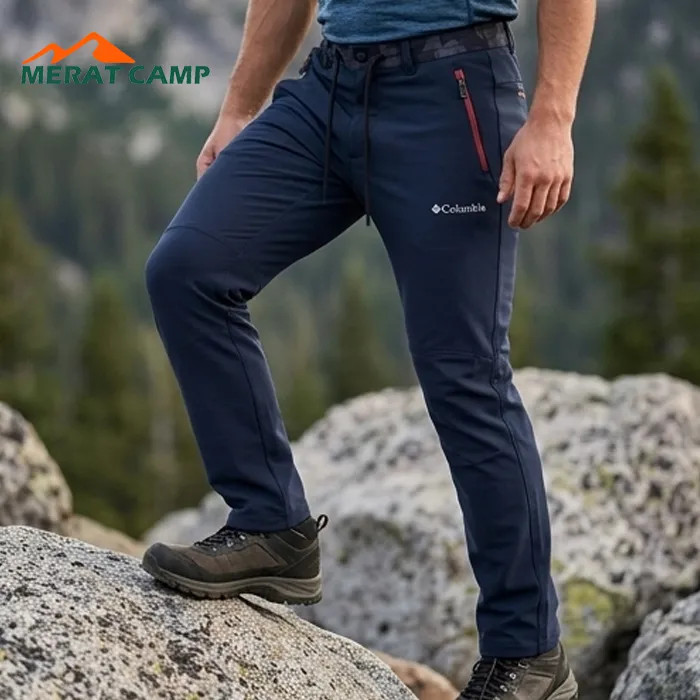 خرید شلوار کوهنوردی کلمبیا مدل Softshell داخل پلار رنگ سورمه ای نما از 3 رخ در کوهستان