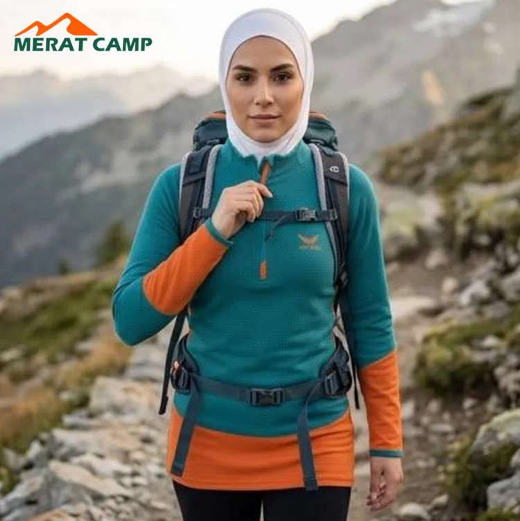 تیشرت نیم زیپ زنانه اسنوهاک رنگ سبز در طبیعت